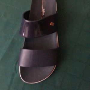 Navy patent and leather sandels.